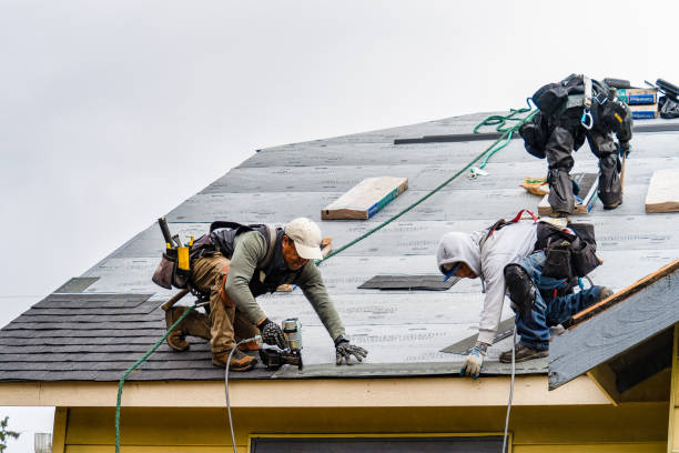 Professional Roofing technician working in Redwood Estates, CA